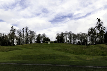 Empty bench on top of the hill