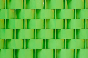 Green metal wicker background, texture