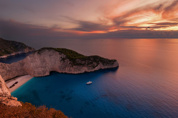 Ship Wreck beach and Navagio bay at sunset. The most famous natural landmark of Zakynthos, Greek island in the Ionian Sea.