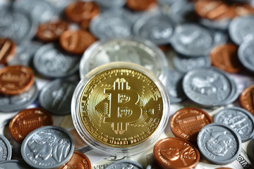 Bitcoin on US paper currency and coin