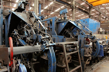 Fototapeta na wymiar Deformed bars steel bundle machine in smelting steel plant.