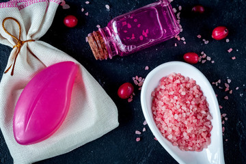 organic cosmetics with extracts of berries dark background top v