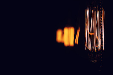 Lamps with tungsten filament. Edison's light bulb. Filament fila