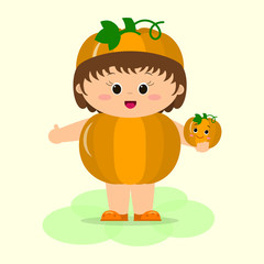 A cute kid in pumpkin suit is holding a vegetable in his hands.