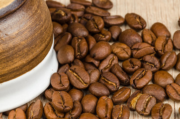 Cup with coffee beans
