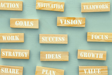 Business concept of success words over wooden blocks.