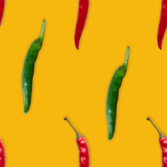Red and green hot pepper seamless pattern on yellow  background