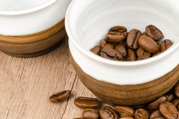 Cup with coffee beans