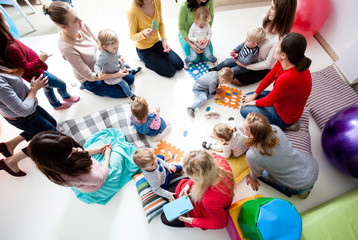 Young moms with their kids