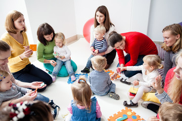 Young moms with their kids