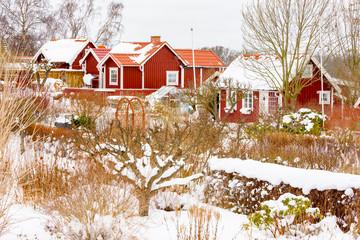 Allotment village Brandaholm in Karlskrona, Sweden, and gardens in late winter or early spring with...