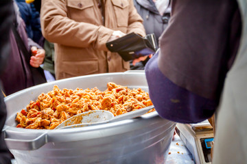 Business with pork scratching at flea market