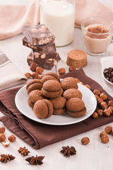 Hazelnut shortbread sandwiches filled with chocolate cream.