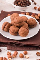 Hazelnut shortbread sandwiches filled with chocolate cream.