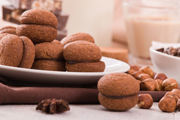Hazelnut shortbread sandwiches filled with chocolate cream.