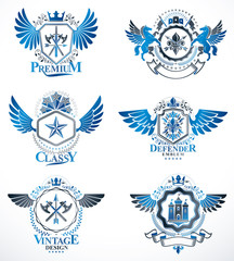 Fototapeta na wymiar Vintage heraldry design templates, vector emblems created with bird wings, crowns, stars, armory and animal illustrations. Collection of vintage style symbols.