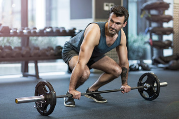 Man exercising in gym
