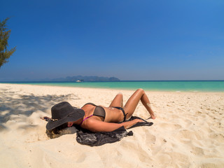 Fototapeta na wymiar Woman at the beach in Koh Poda island Thailand