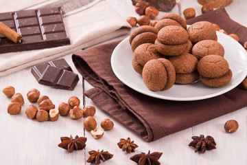 Hazelnut shortbread sandwiches filled with chocolate cream.