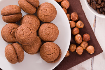 Hazelnut shortbread sandwiches filled with chocolate cream.