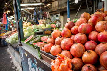pomegranates at a market in Tel Aviv, Israel