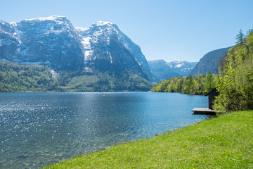 Beautiful harbor, clear lake and snow mountains in Obertauern, Austria