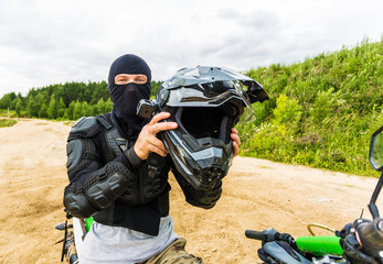 Motocross racers on landscape