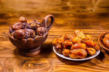 Date fruits on the rustic wooden table