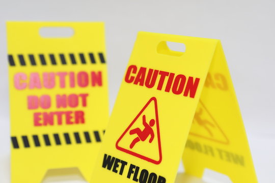 Caution Do Not Enter And Wet Floor Signage