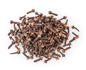 Heap of dried cloves isolated on white background