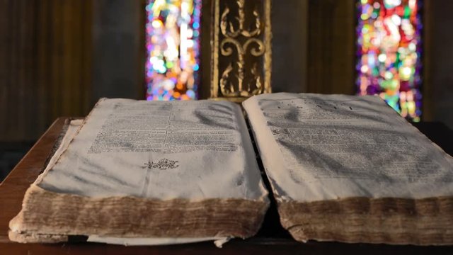 Book of Magic spells cinematic shot. Beautiful ancient grimoire book, with cinematic light