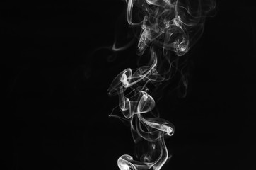 abstract movement of white smoke in dark background.