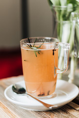 Tasty fruit tea with rosemary, healthy beverage