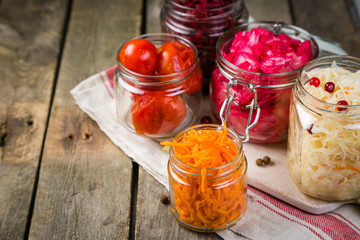 Selection of fermented food - carrot, cabbage, tomatoes, beetroot, copy space