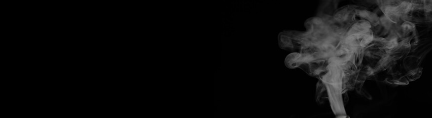 White smoke on a black background. Texture of smoke. Clubs of wh