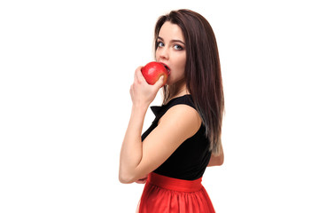 Beautiful young smiling woman holding an apple in her hands on a white background isolation