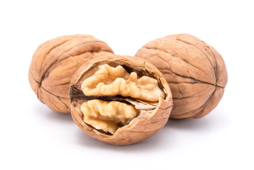 walnuts with cracked walnut isolated on the white background