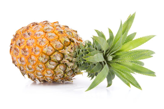 Whole tasty pineapple fruit isolated on white background
