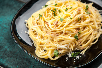 Spaghetti carbonara with egg and pancetta