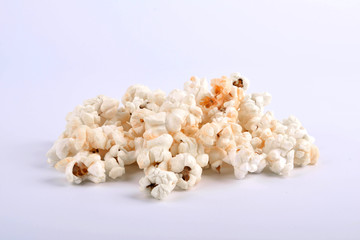  a bunch of popcorn on a gray background