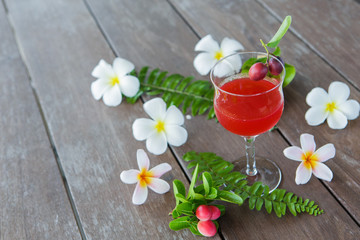 The red juice of ancient Thailand name carunda or karonda (Carissa Carandas L.), Thai herb juice.