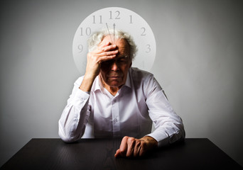 Grief. Old man in thoughts. Old man is waiting. Three Minutes to Twelve.