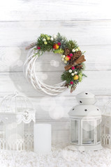 Christmas wreath on a wooden background. Holidays
