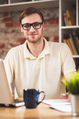 Young man with a laptop