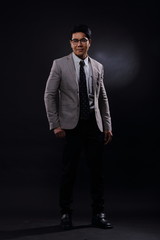 Obraz na płótnie Canvas Full Length Snap Figure, Business Man Stand in gray Suit white shirt black pants