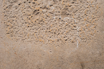 Old weathered stone surface - vintage background of sandstone