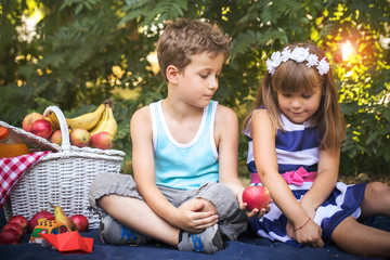 Happy cute little girl and a boy couple