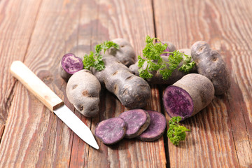 red potato on wood background