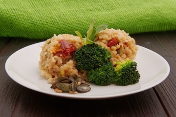 Rice risotto with vegetables on a table