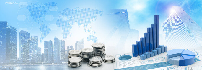 coins and charts in cityscape blue background